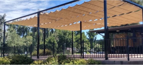 Slide-on-wire canopy installation at Bella Brew restaurant