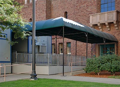 Custom canopy with turn - By Goodwin-Cole for Sacramento Memorial Auditorium