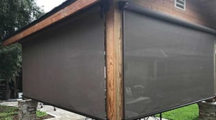 patio with outdoor roller shade screens